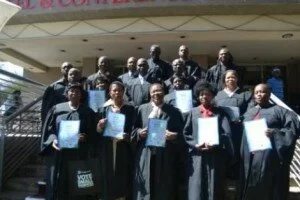 Imbizo Business Acumen graduates proudly show off their certificates.