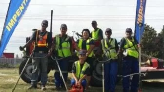 Zaliah Stoltenkamp of Impenthana Projects and Maintenance (middle) with her employees